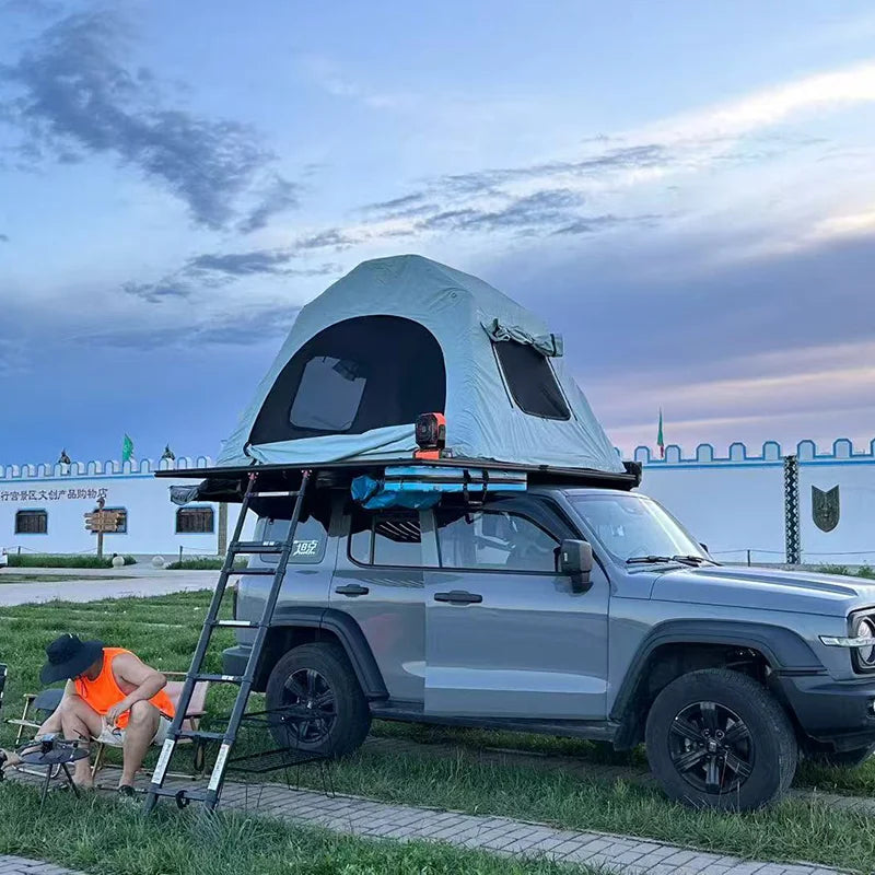Roof-mounted inflatable tent