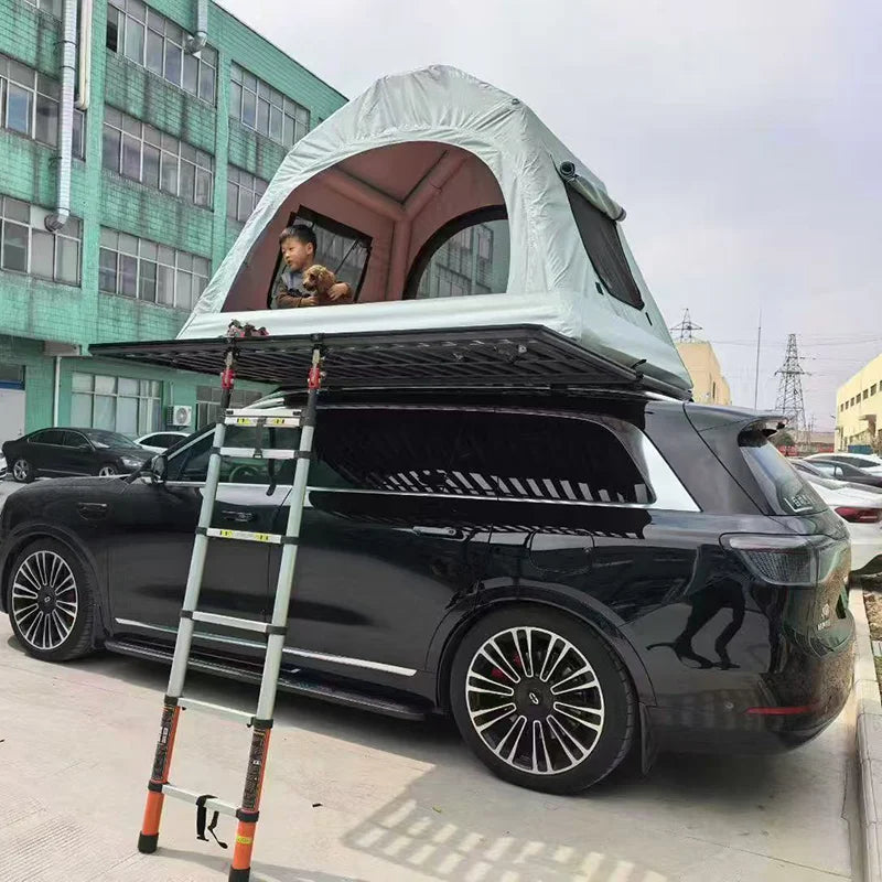 Roof-mounted inflatable tent